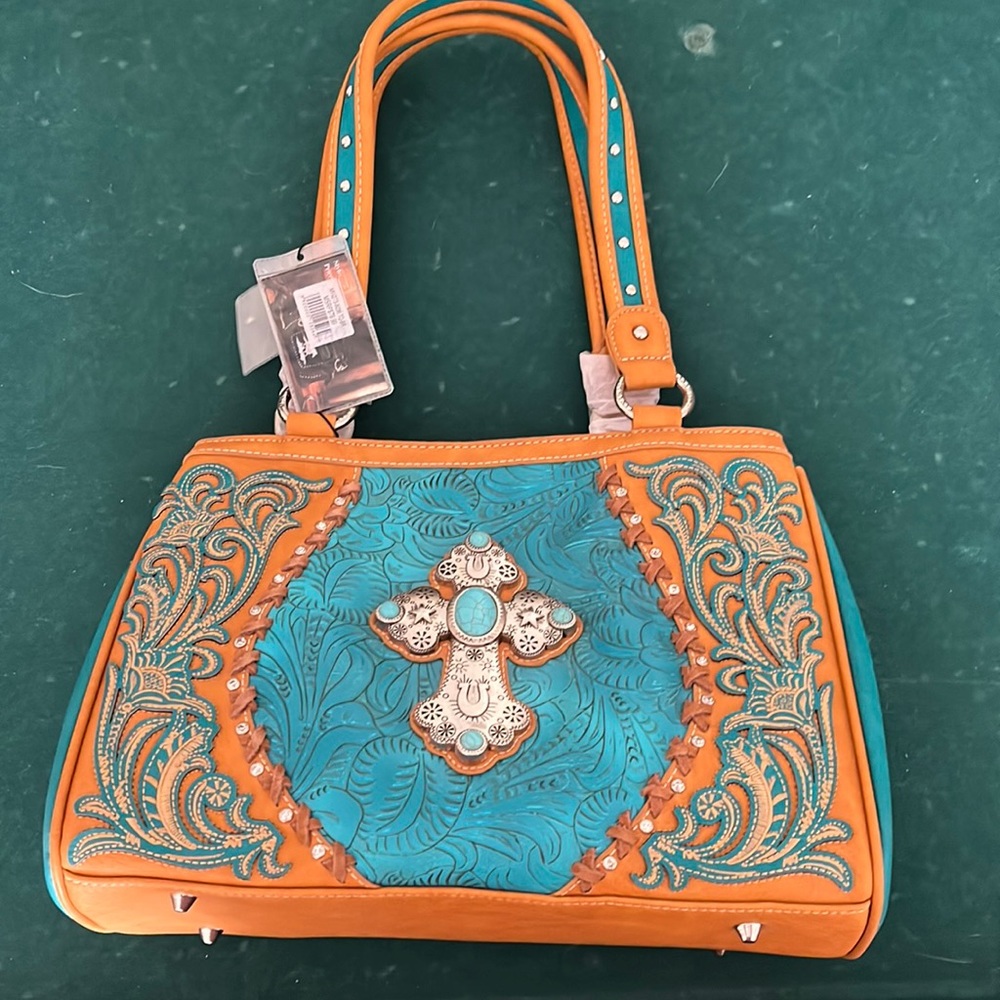 Brand new Montana west This bag is priced as low as I can, so price is FIRM!